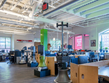Open work space for Robotics company at 212 Elm Street in Davis Square in Somerville, MA.