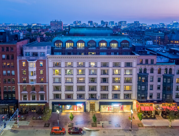 Front of 745 Boylston Street in Boston's Back Bay at night.