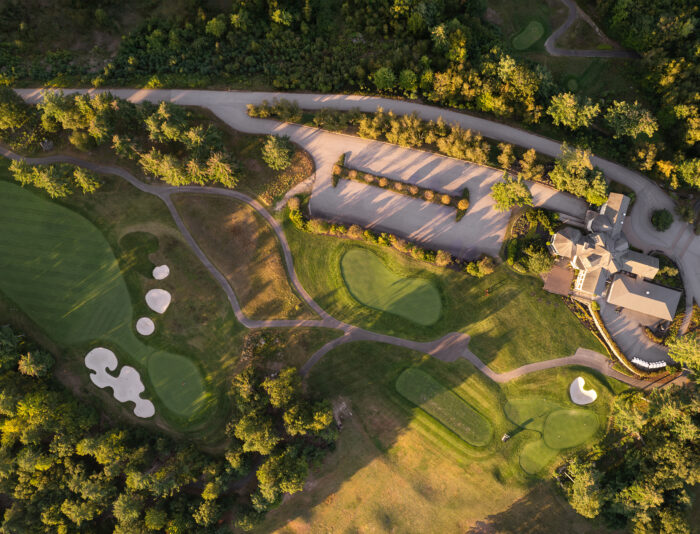 Aerial view of several golf holes at Lake Winnipesaukee Golf Club.